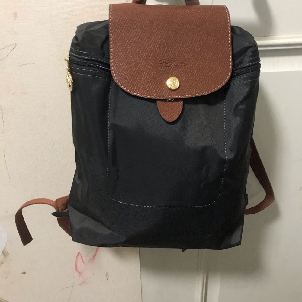 Longchamp Black Nylon Backpack with Brown Trim and Gold Accent